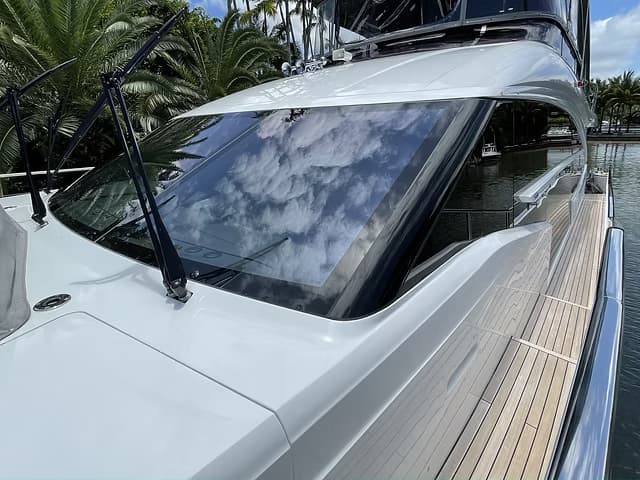Marine window tint installation on boat in Tampa Bay