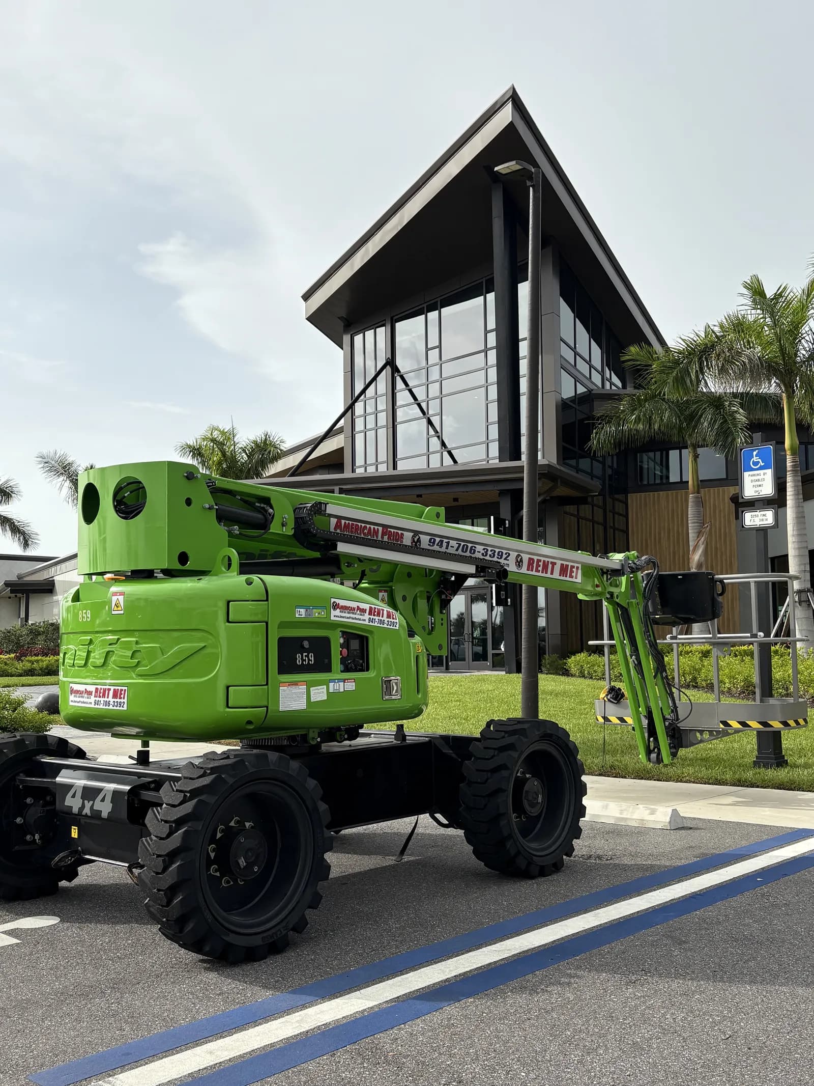 Commercial building window tint with boom lift
