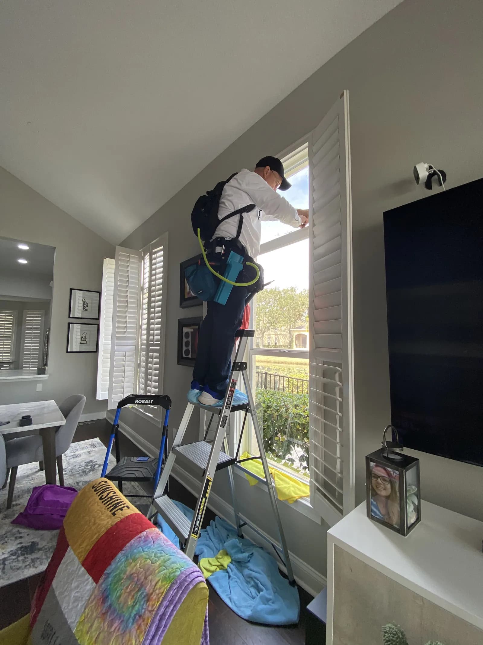 Professional installer in residential living room